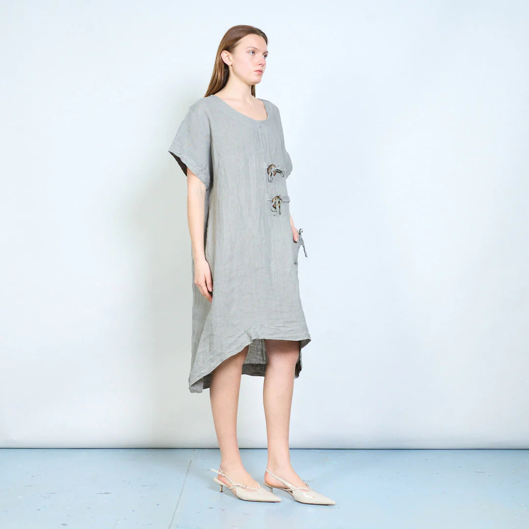 Abito donna ampio con laccetti decorativi e tasca