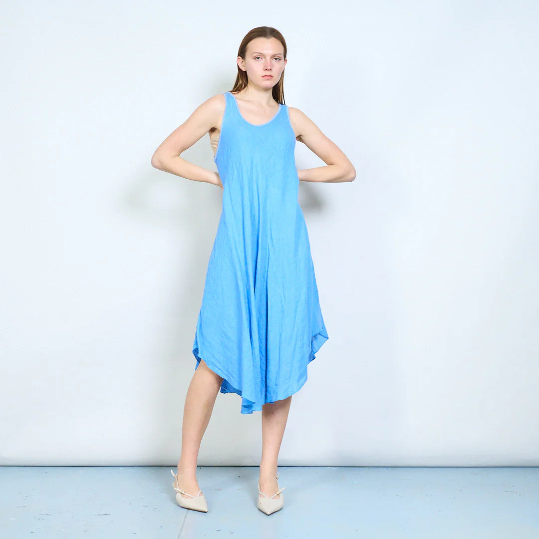 Abito midi donna senza maniche con orlo asimmetrico