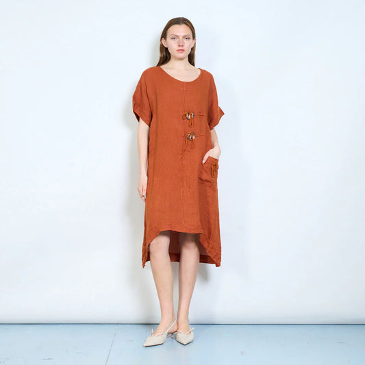 Abito donna ampio con laccetti decorativi e tasca