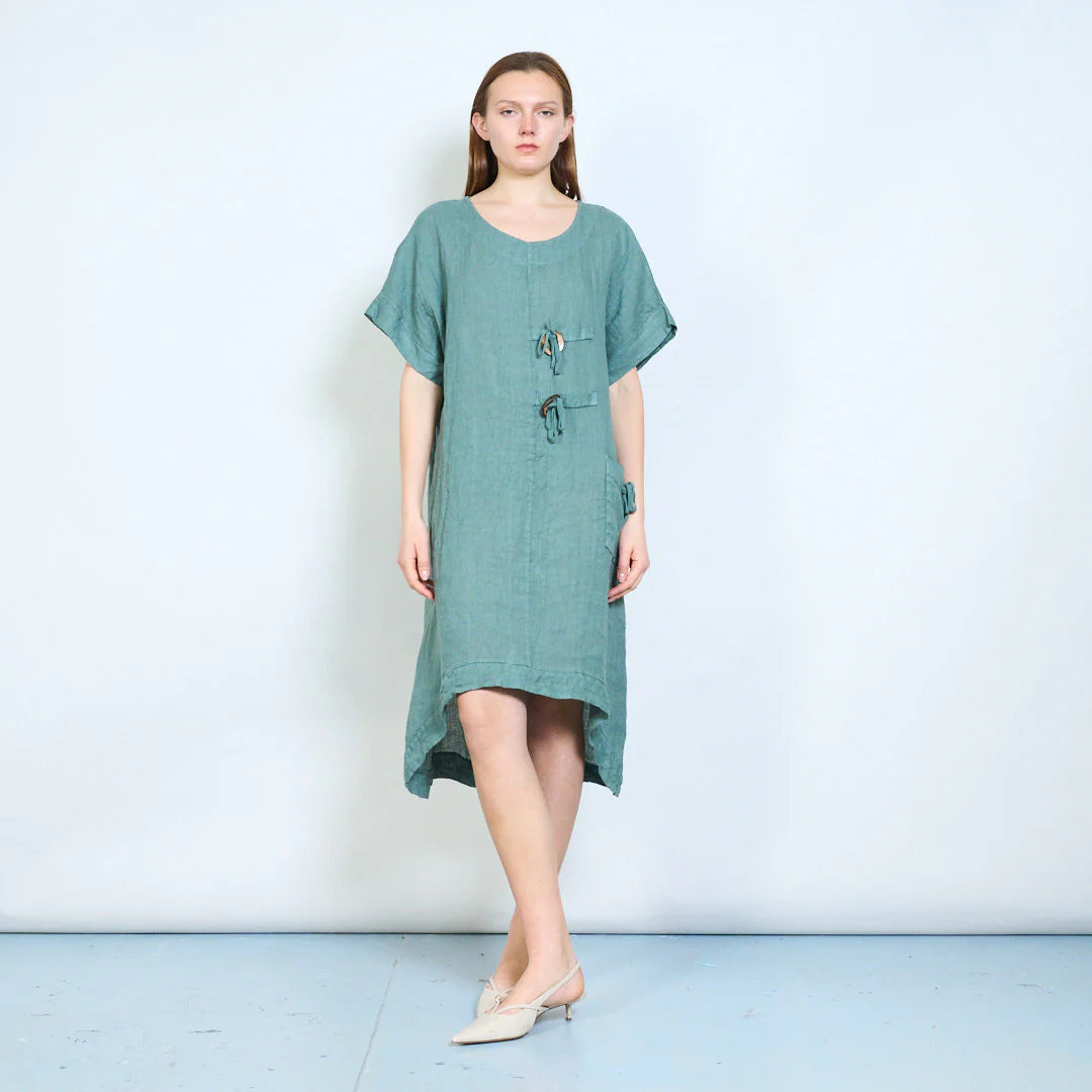 Abito donna ampio con laccetti decorativi e tasca