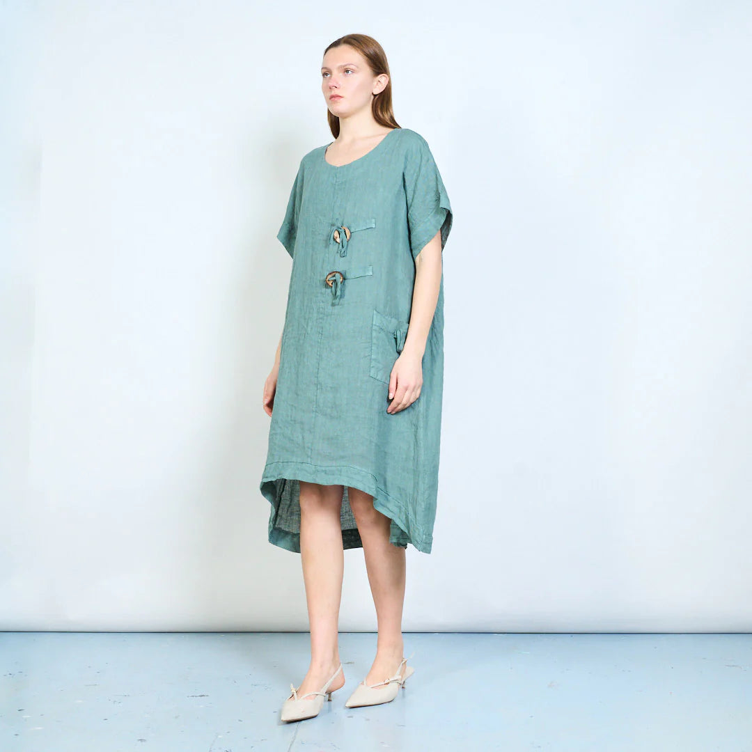 Abito donna ampio con laccetti decorativi e tasca