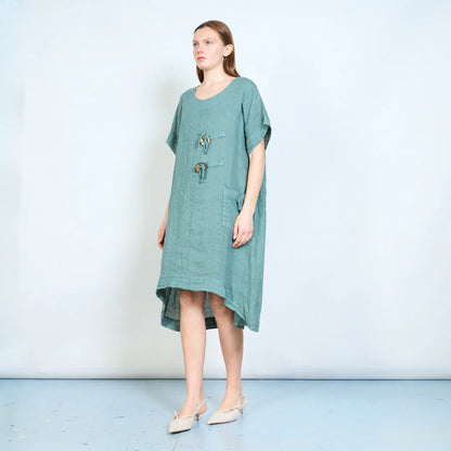 Abito donna ampio con laccetti decorativi e tasca