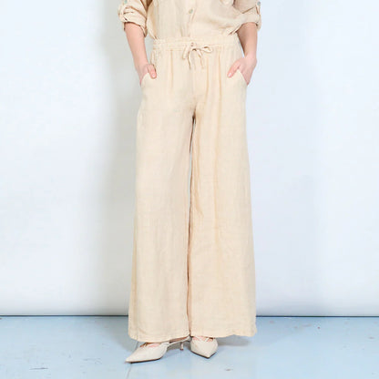 Pantaloni palazzo donna in lino con coulisse e tasche