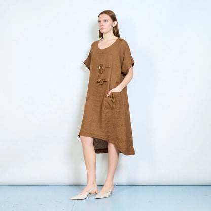 Abito donna ampio con laccetti decorativi e tasca