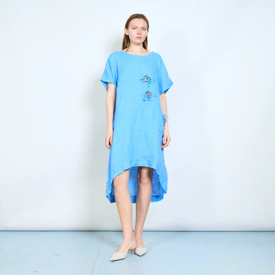 Abito donna ampio con laccetti decorativi e tasca