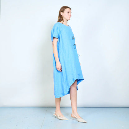 Abito donna ampio con laccetti decorativi e tasca